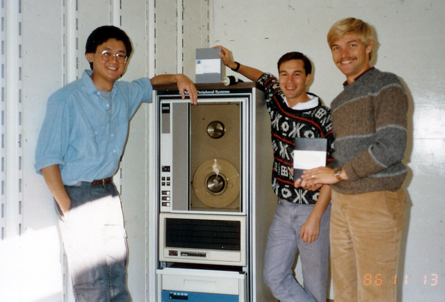 The original founders (from left, Richard, Glenn and Carl) with a PDP-11.