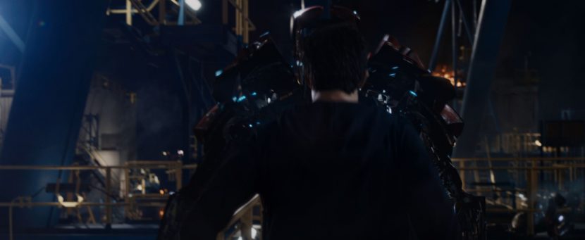 Tony Stark about to enter one of the transforming Iron Man suits.
