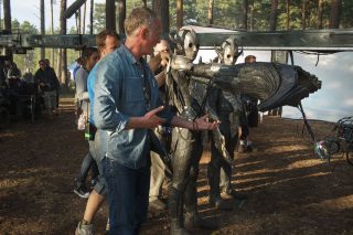 Director on the set of Thor: The Dark World.