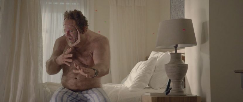 A shot showing the actor wearing a partial facial appliance.