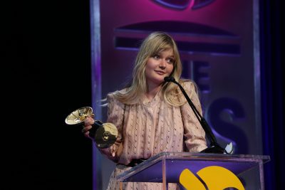 Actress Sophie Kennedy Clark accepted this award on behalf of the winners.