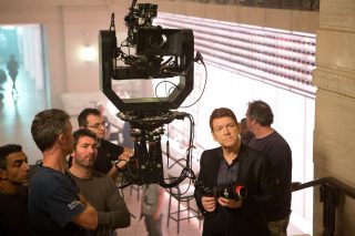 Director Kenneth Branagh and crew on set.