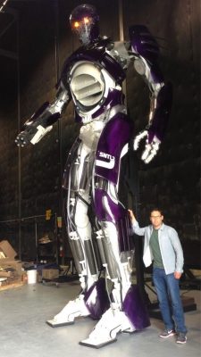 Bryan Singer poses with the full-scale Sentinel prop, in an image posted on the director's Twitter account.