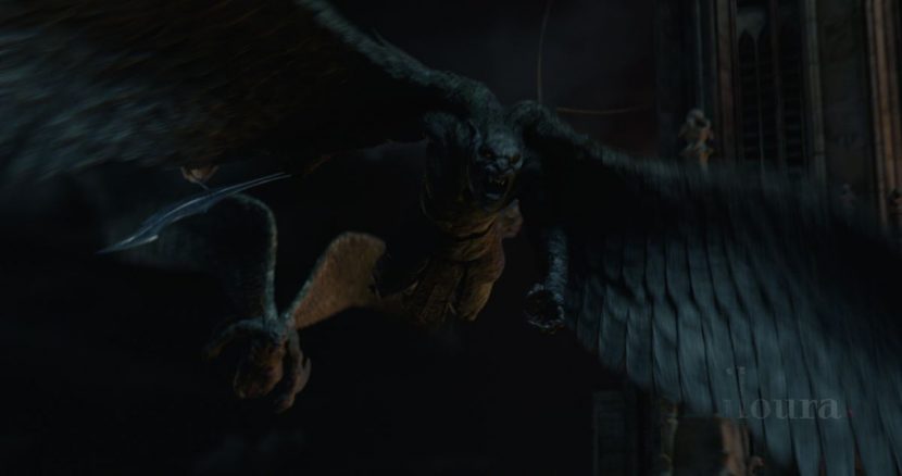 A gargoyle with wings outstretched.