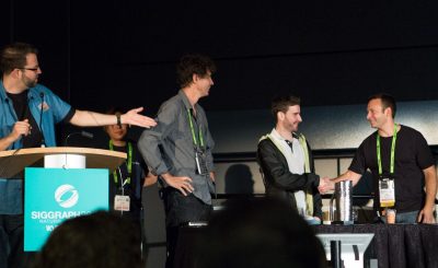 Paul Debevec (right) invited researcher Ari (right) on stage to celebrate his digital double Ira