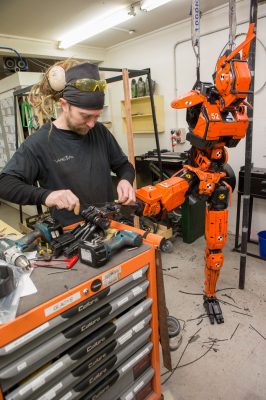 A practical orange prototype droid under construction at Weta Workshop. Photo credit: Steve Unwin.