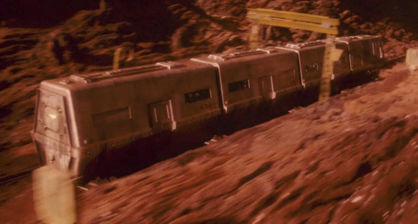 The train marked '43A' travels across the surface of Mars in a dramatic combination of live action projection, miniature landscapes and matte paintings.