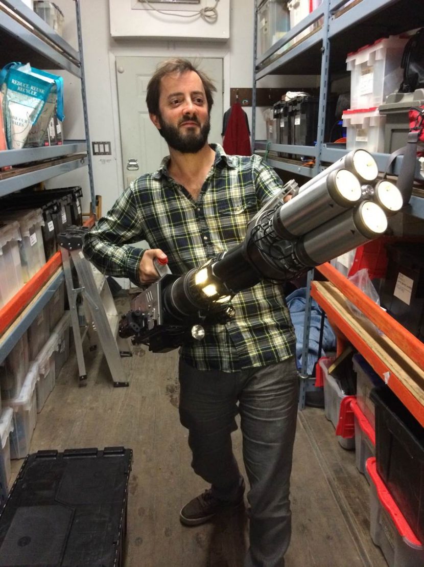 Jean tests the feature film props, in this case, a ray gun.