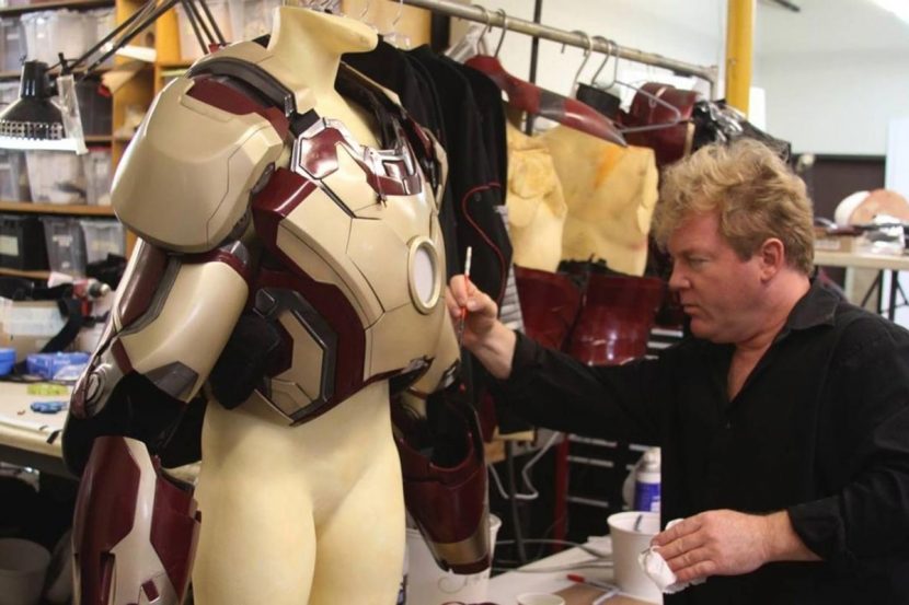 Shane Mahan works on an Iron Man suit.