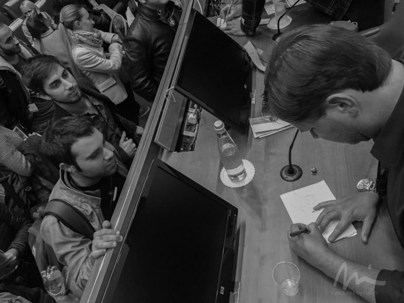 McIntosh (right) spent much of VIEW generously sketching dinos from Jurassic World for eager attendees. Photo by Michael Rubin. Website: http://www.byrubin.com.